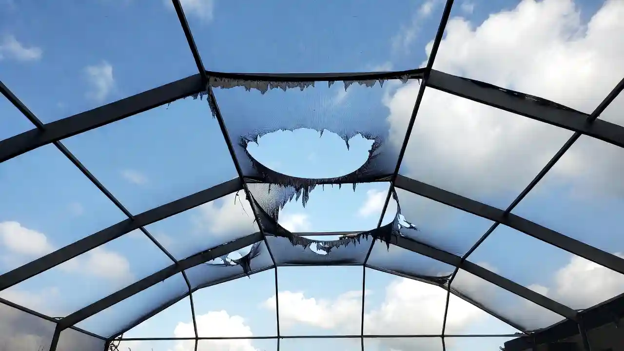 Wind-damaged pool cage screen panels